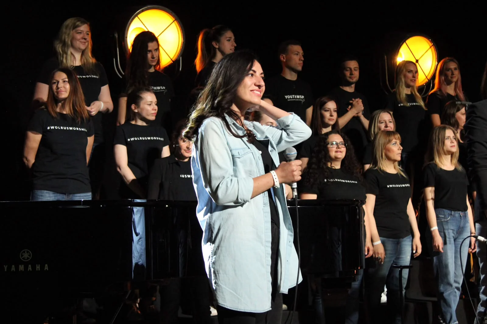 Nelli on stage with ensemble